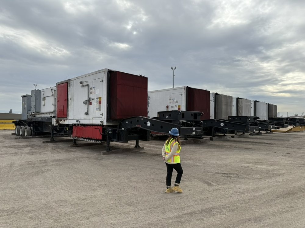 Several TM2500 modules on transport trailers staged in a yard